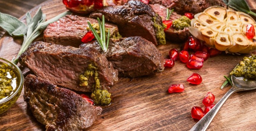 Meat steak with green pesto